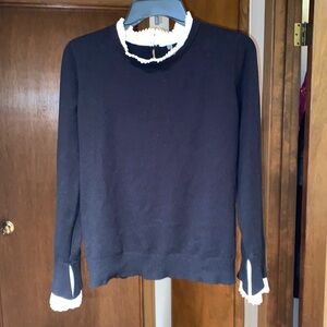 Black ruffled sweater